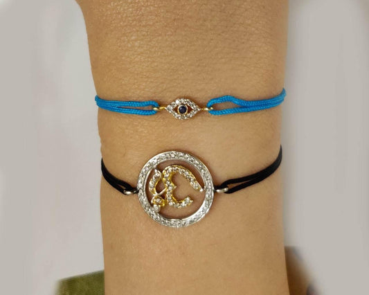 Evil Eye charm bracelet with Diamonds & Sapphire in Gold - Jewelslane