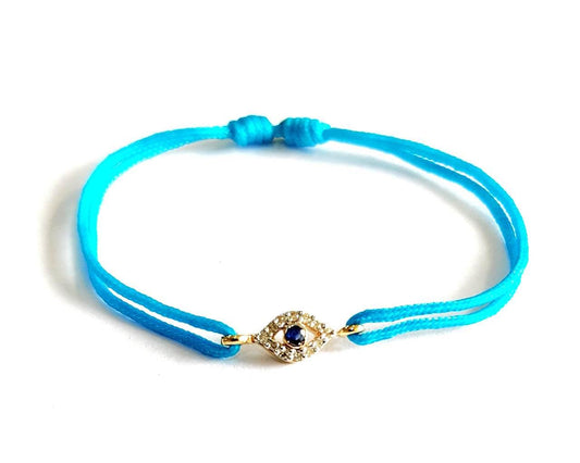 Evil Eye charm bracelet with Diamonds & Sapphire in Gold - Jewelslane