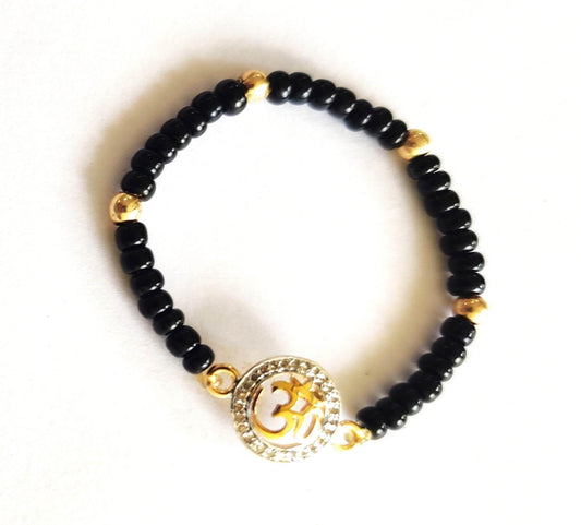 New Born Baby Girl Om Diamond Bracelet with Black Nazaria beads - Jewelslane