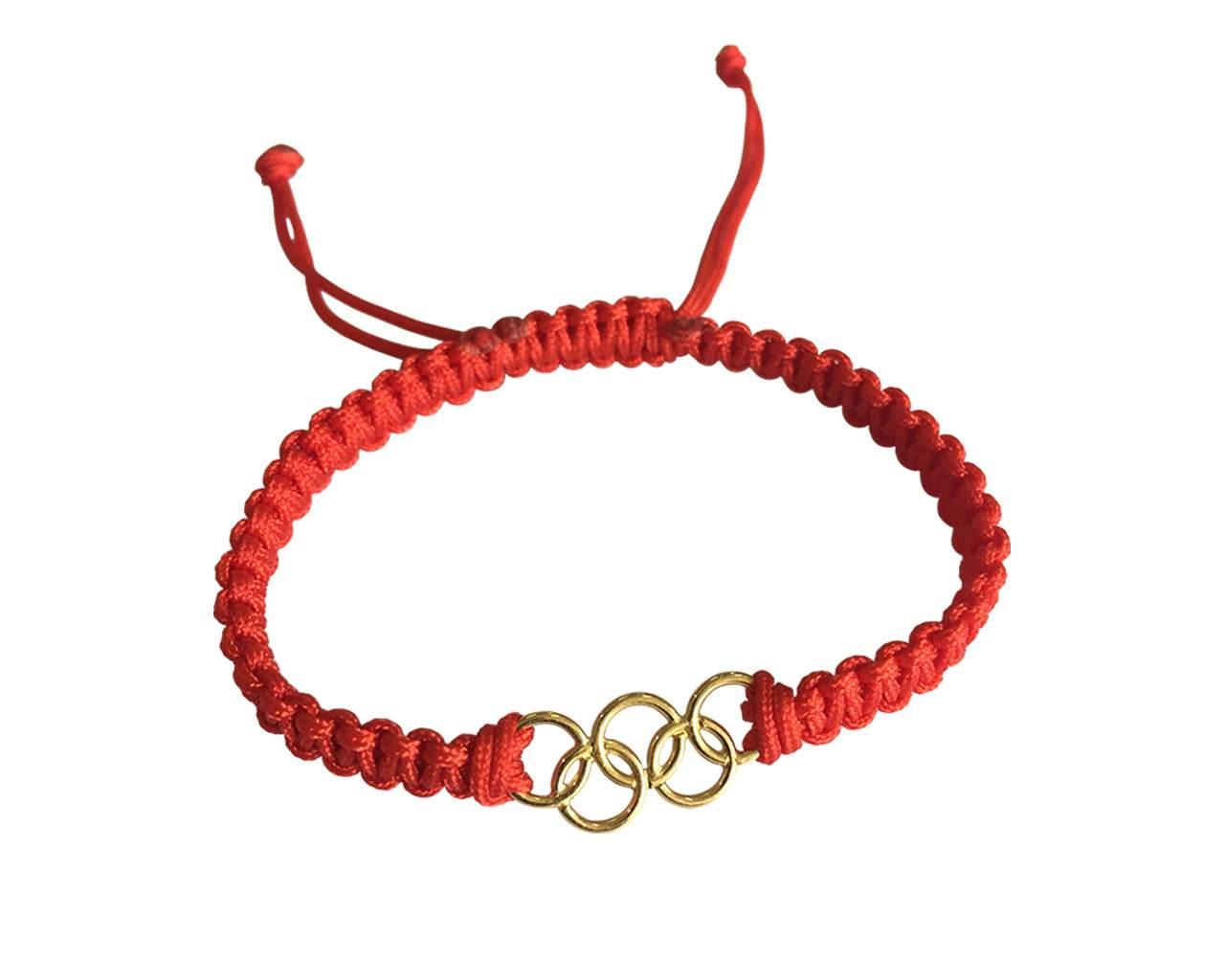 Olympic Rings in Gold on size adjustable thread band - Jewelslane