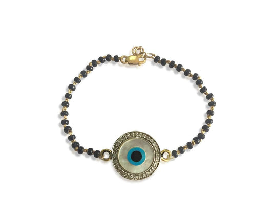 Evil eye bracelet on Mangalsutra chain in gold - Jewelslane