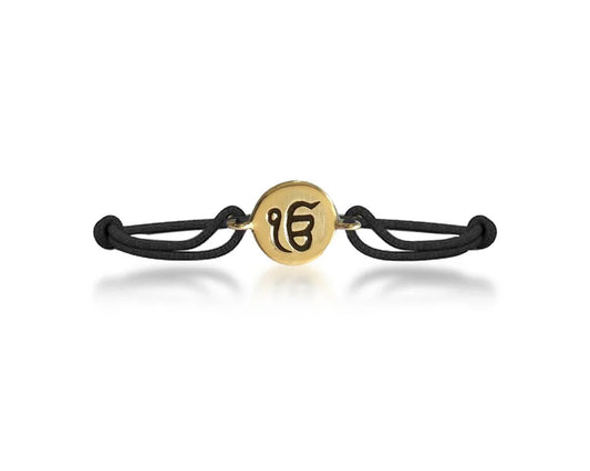 Authentic Ik Onkar Bracelet in 14k Gold for New Born Baby on adjustable black thread nazaria - Jewelslane