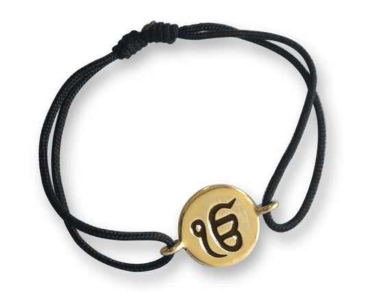 Authentic Ik Onkar Bracelet in 14k Gold for New Born Baby on adjustable black thread nazaria - Jewelslane