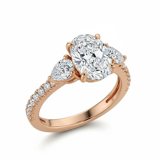 Joice 4 Carat Oval Diamond Ring with pear side stones and pavé shank in gold, rose gold, and white gold – JewelsLane