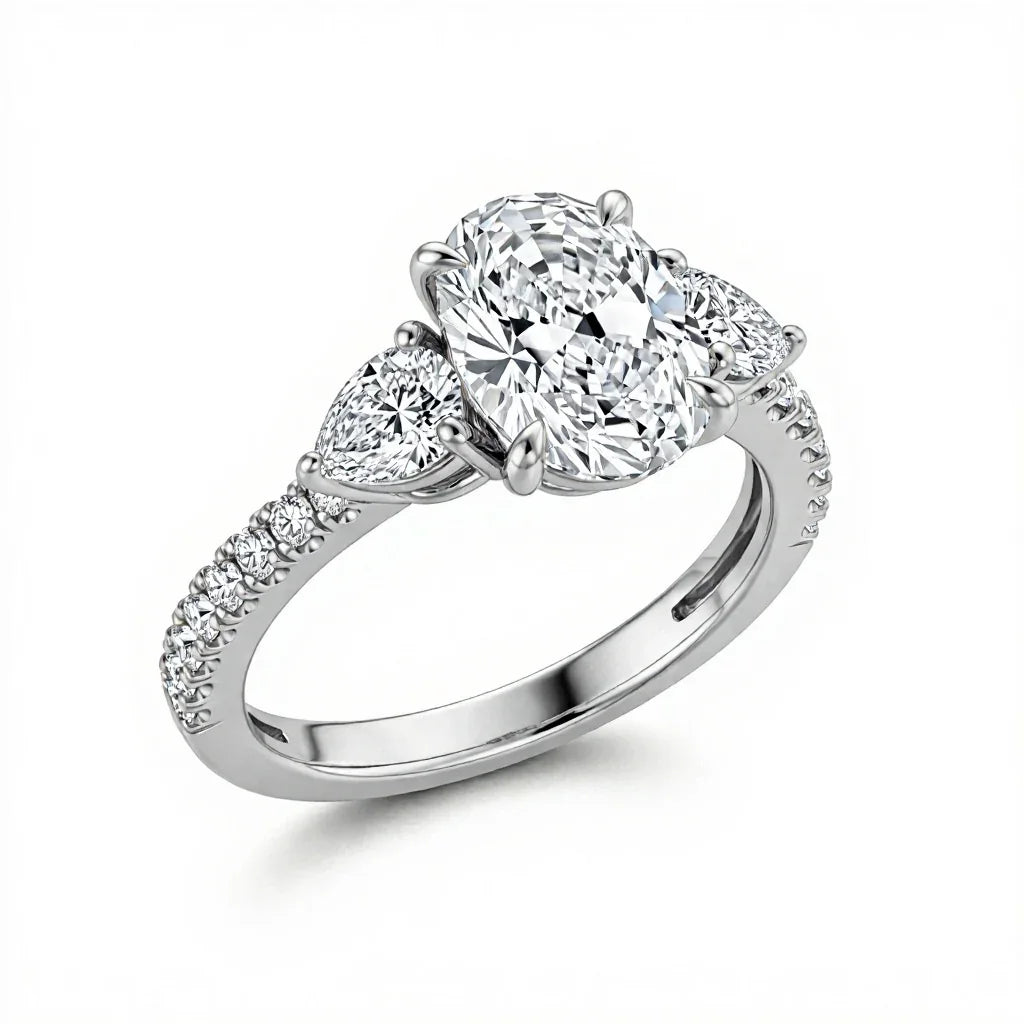 Joice 4 Carat Oval Diamond Ring with pear side stones and pavé shank in gold, rose gold, and white gold – JewelsLane
