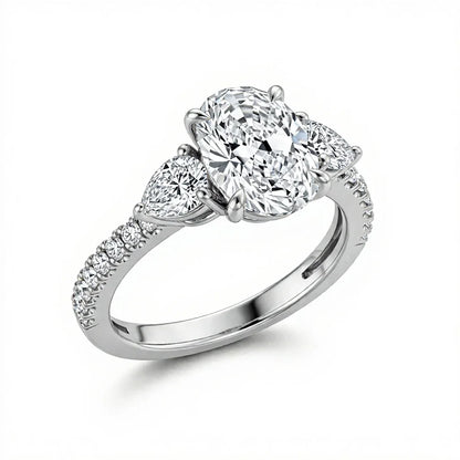 Joice 4 Carat Oval Diamond Ring with pear side stones and pavé shank in gold, rose gold, and white gold – JewelsLane