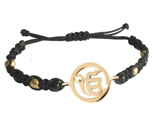 New Born Baby Ik onkaar Bracelet In Gold With Black & Gold Beads For Nazaria - Jewelslane