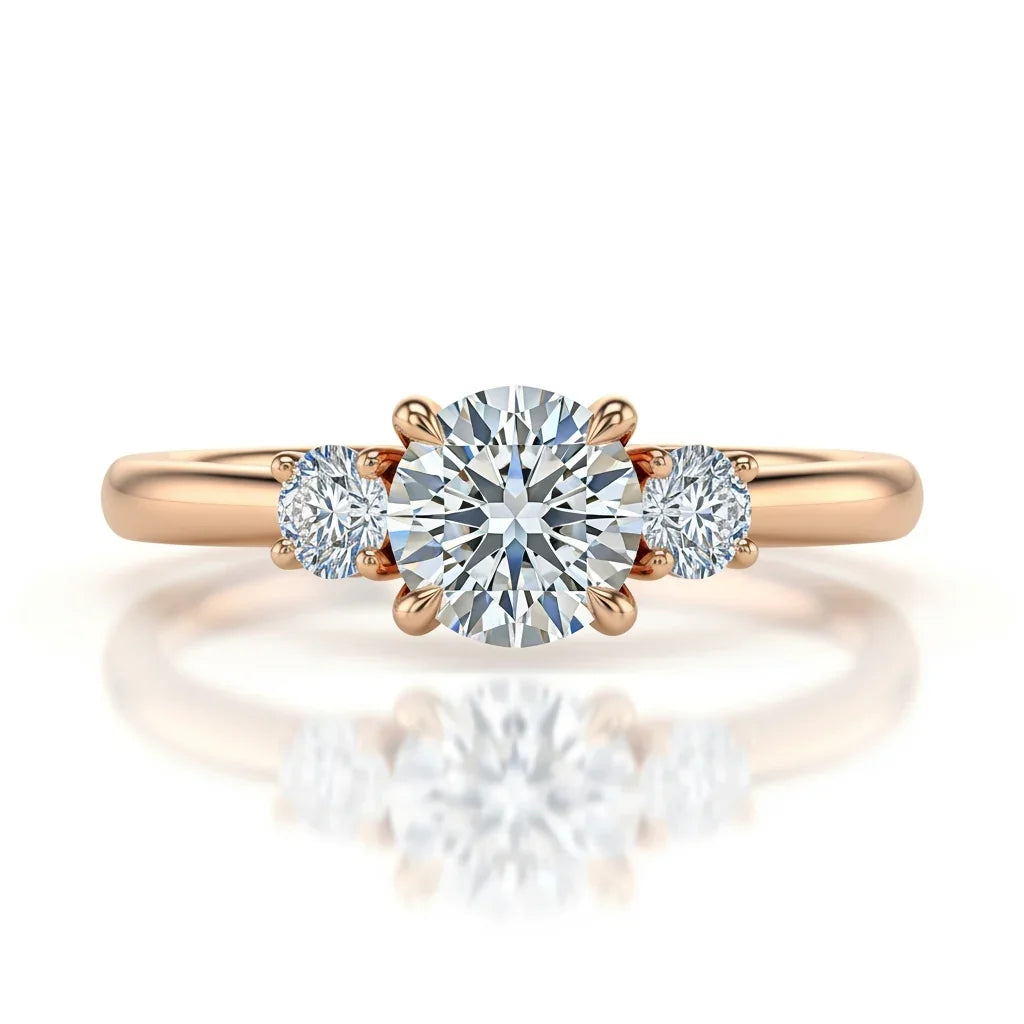 Wei Round Brilliant Cut Diamond Solitaire Ring in yellow gold, rose gold, and white gold with G color VS clarity centre flanked by two 8-cent round diamonds