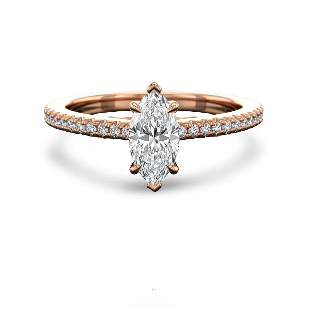 Wyn Marquise Shape Lab Diamond Solitaire Ring in yellow gold, rose gold, and white gold with G color VS clarity marquise and small diamonds on a simple shank