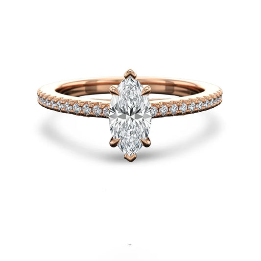 Wyn Marquise Shape Lab Diamond Solitaire Ring in yellow gold, rose gold, and white gold with G color VS clarity marquise and small diamonds on a simple shank