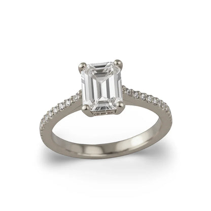 Wyna Emerald Cut Lab Diamond Solitaire Ring in yellow gold, rose gold, and white gold with 50-pointer G color centre and small diamonds on a simple shank